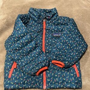 Patagonia Teal Floral Puffer Jacket with Red Accents
